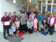 The DG1 Neighbours group proudly holding their Civic Champions certificate. Image courtesy of Sustrans Scotland.